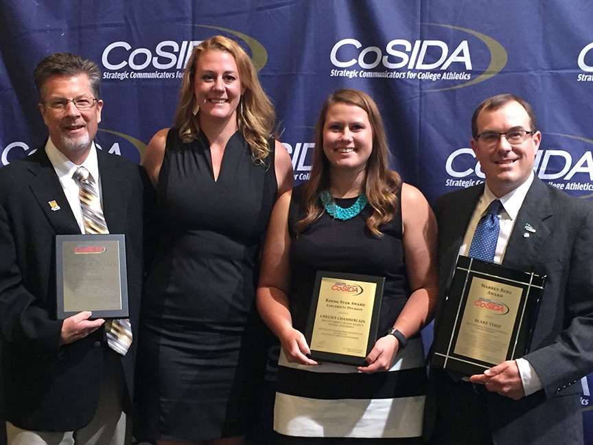 When Timm won the Warren Berg Award in 2017, he shared the moment with, left to right: good friend Dave Reed of Colorado College who won the Achievement Award; Megan Hardin, now of St. Edward’s, who won the College Division Rising Star Award; and his former assistant at Pacific, Chelsey Chamberlain of LSU, who won the University Division Rising Star Award.